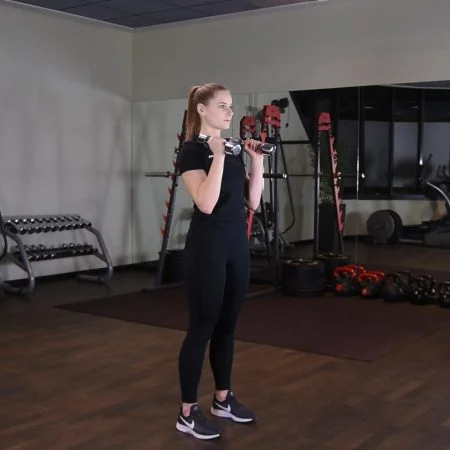 Wyciskanie hantelek nad głowę stojąc - just be fit